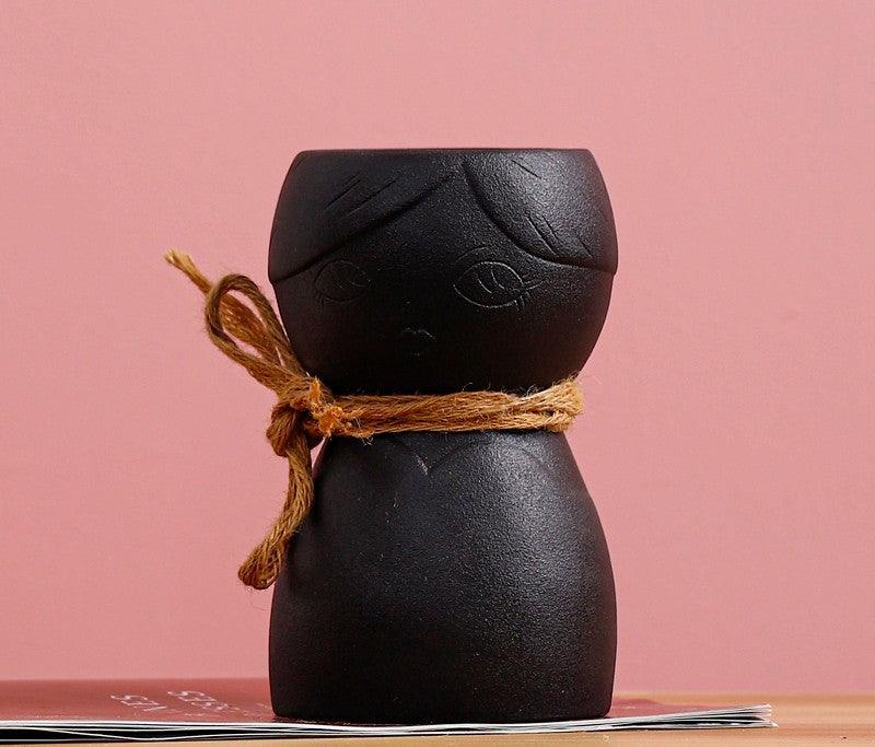 Porcelain Face Vase On Porch Table - Pacisia