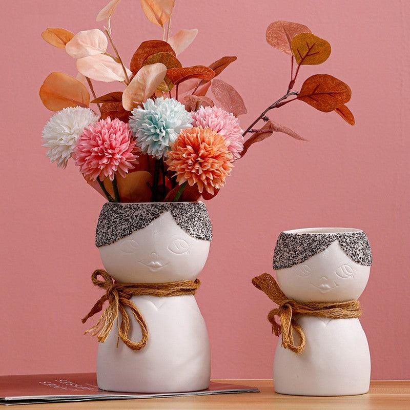 Porcelain Face Vase On Porch Table - Pacisia