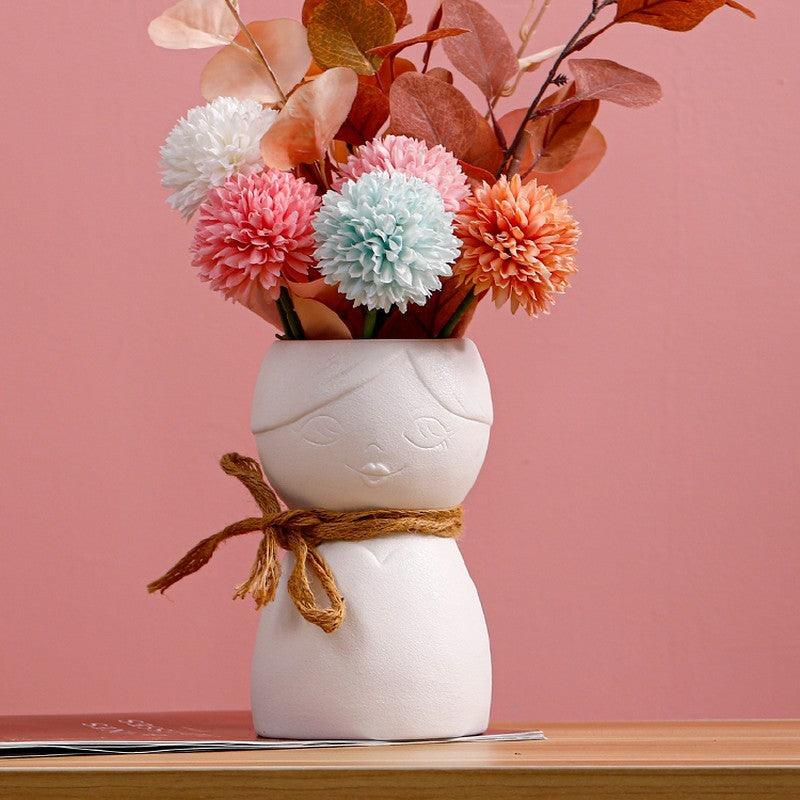 Porcelain Face Vase On Porch Table - Pacisia