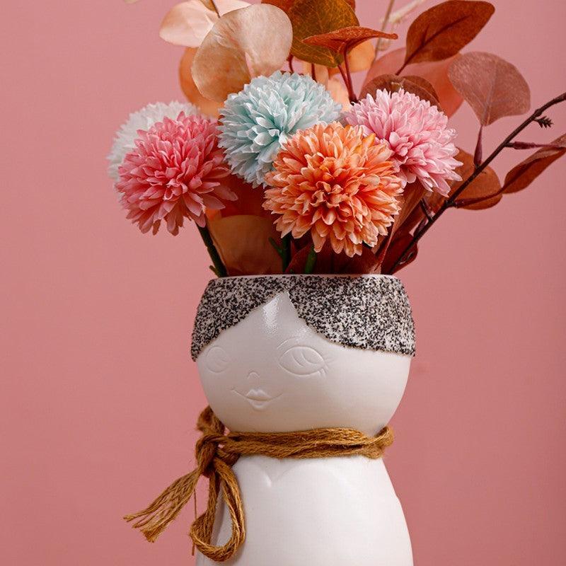 Porcelain Face Vase On Porch Table - Pacisia