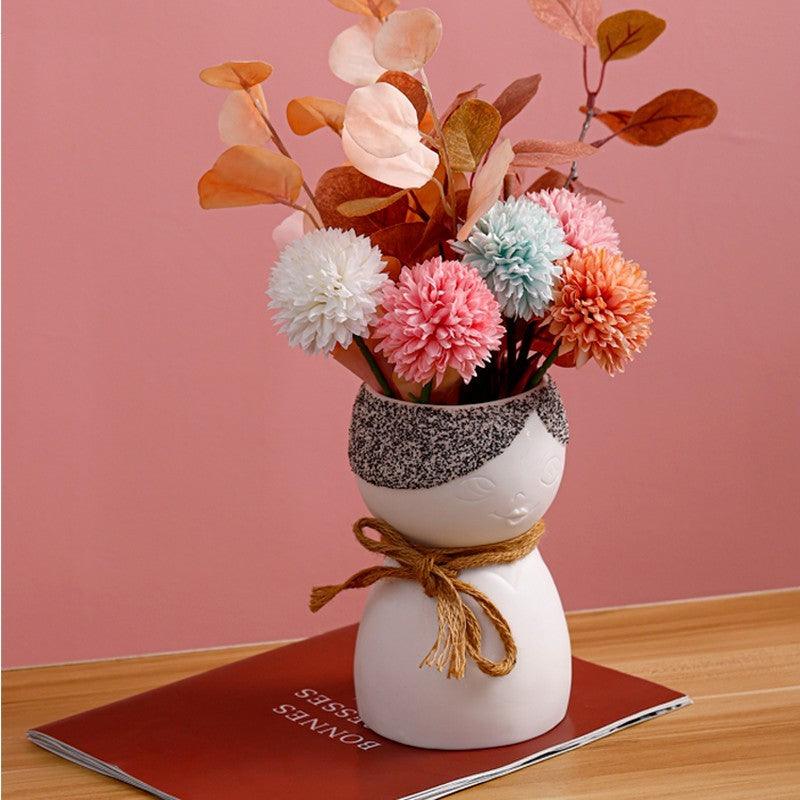 Porcelain Face Vase On Porch Table - Pacisia