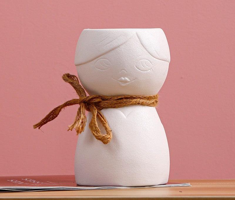 Porcelain Face Vase On Porch Table - Pacisia