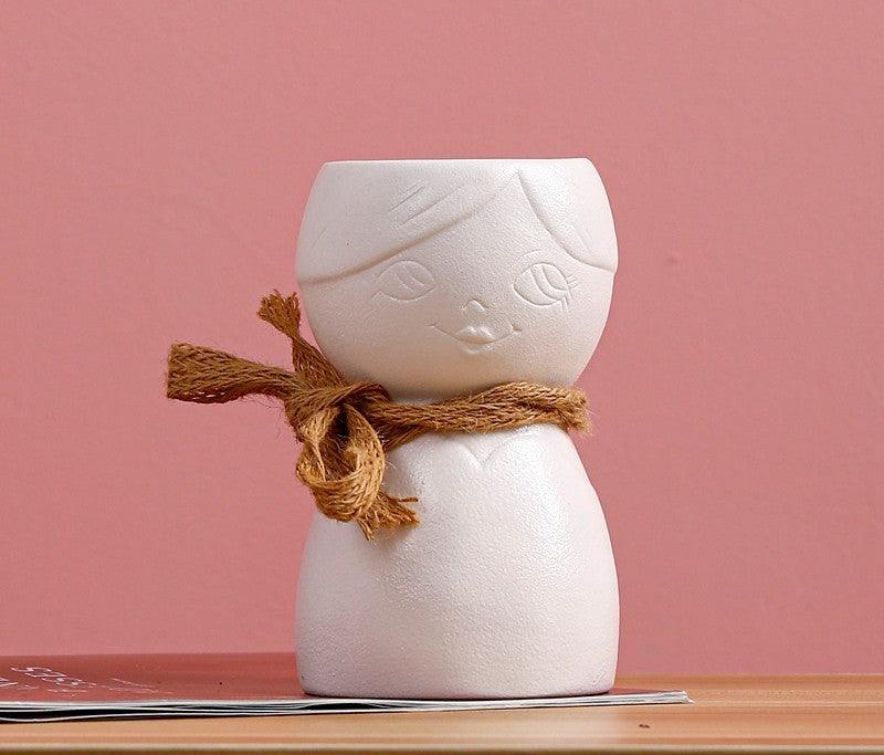 Porcelain Face Vase On Porch Table - Pacisia